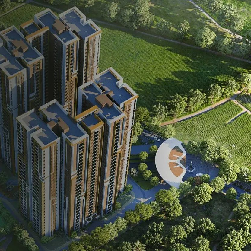 An aerial view of the towers beside a white sculptural pavilion and a fountain court