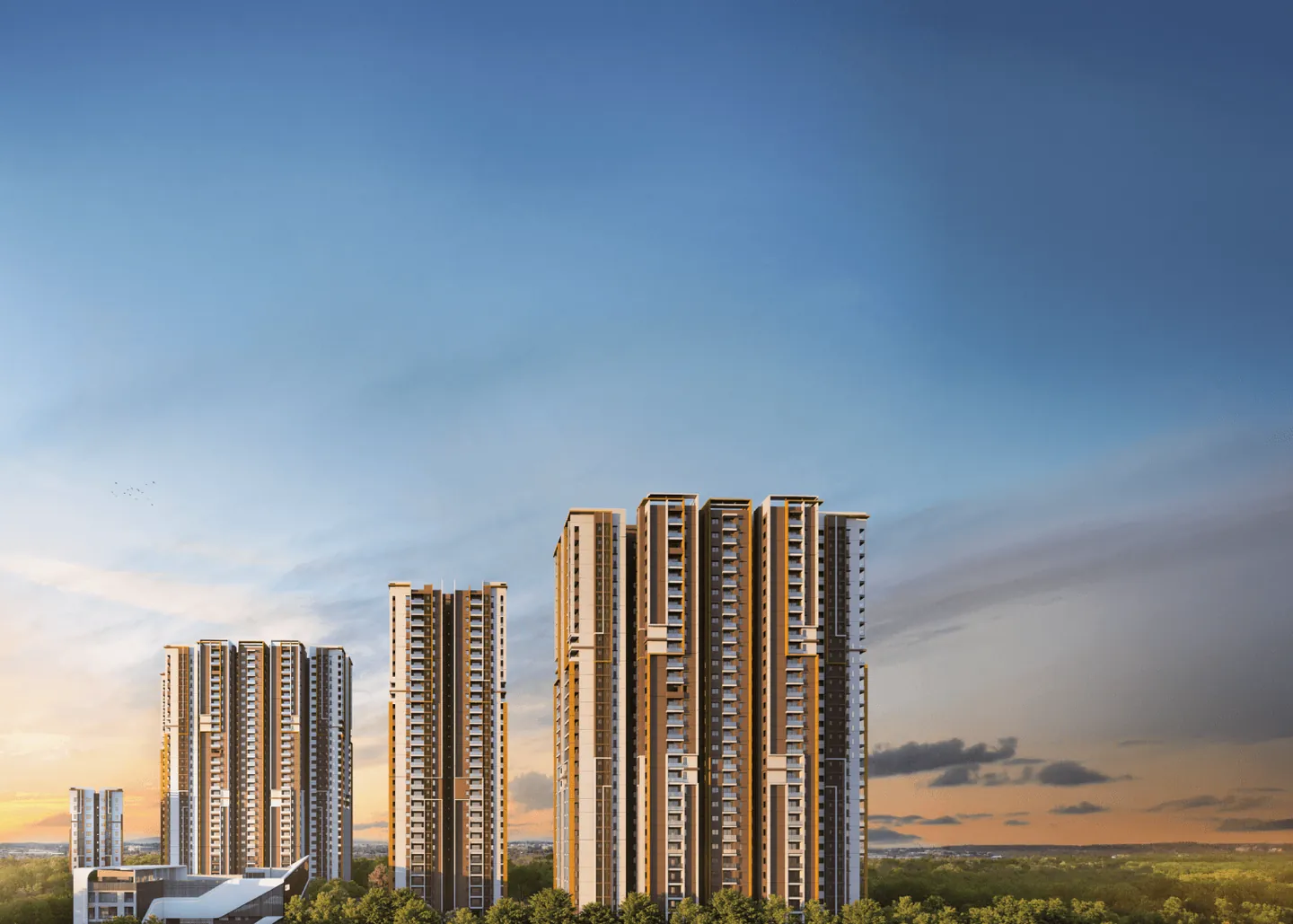 The towers of DSR The Address against a sunset sky, above a band of trees